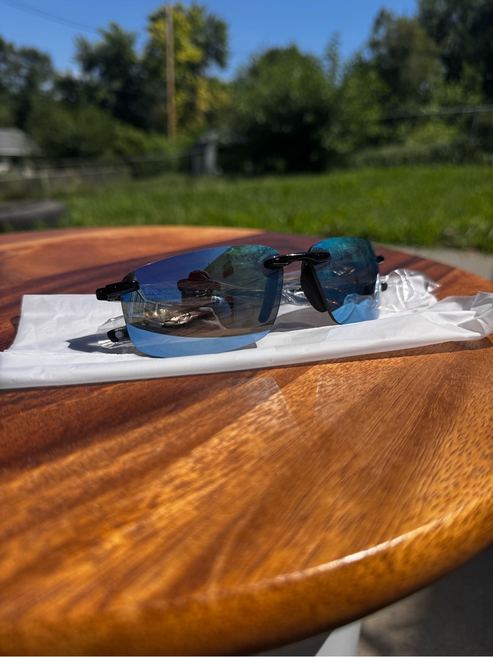Revo Descend N RE 4059 Polarized Rimless Wrap Sunglasses Black Frame Blue Lens